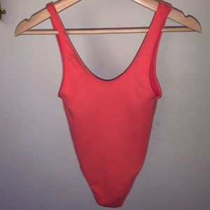 Hot pink body suit